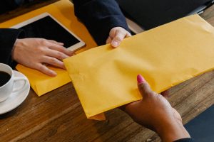 handing out a document